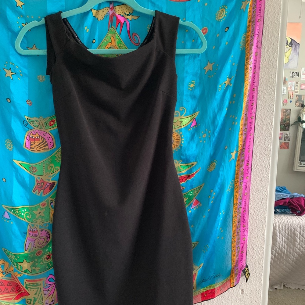 Black curve hugging dress!